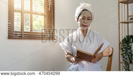 Senior Woman Facial Spa And Skin Care Concept At Home