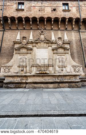Bologna, Italy, - Feb 23, 2020: Fontana Vecchia Or Della Gabella Vecchia (1565) And Accursio Palace,