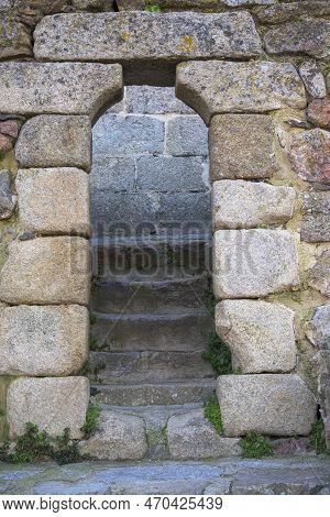 Stone Arch With Stairs To Climb Bell Tower Of Church Of Santa Maria In Hervas Vertical