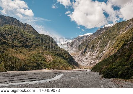 The Alluvial Bed Of The Waiho River Flowing From The Franz Josef Glacier And Snow Capped Mountains I