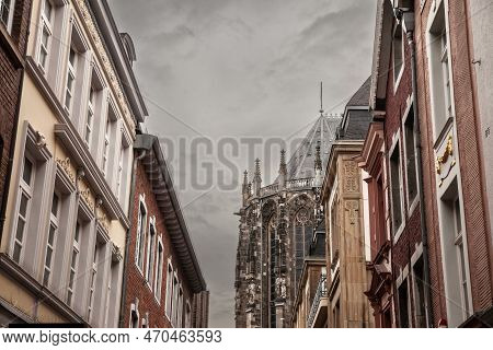 Aachen Cathedral Seen From The Old Town With Residential Buildings. Aachen Cathedral, Or Aachener Do