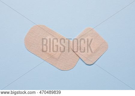 Contraceptive Patches On Light Blue Background, Flat Lay