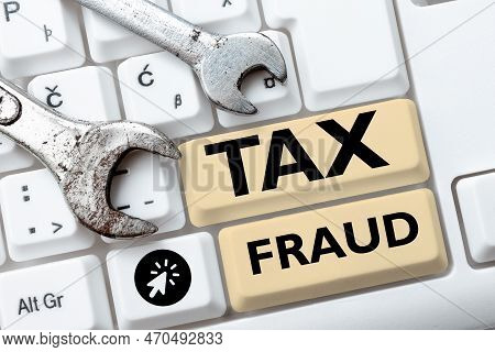 Text Showing Inspiration Tax Fraud. Word Written On Entails Cheating On A Tax Return In An Attempt T