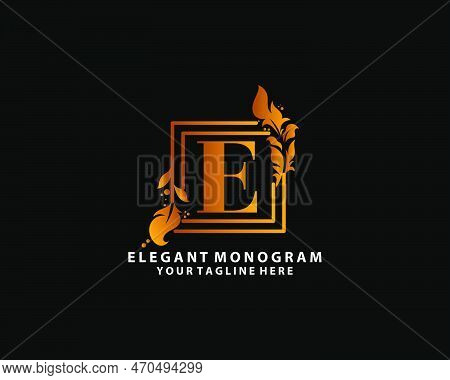 Golden Initial Letter E. Elegant Design Letter E With Floral Branch. Luxury Gold Logo Icon. Vintage 