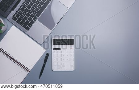 Calculators, Laptops And Notebooks Are Placed On The Table,

Concept Of Calculating Company Financia