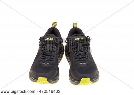 Beautiful View Of Black Yellow Hoka Sneakers Isolated On White Background. Sweden. Uppsala. 02.11.20