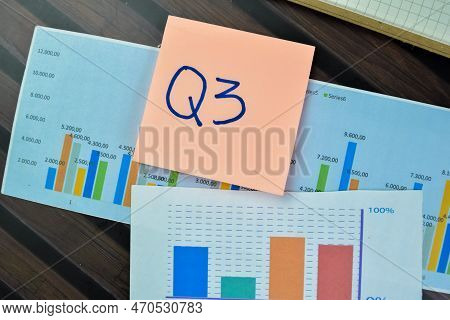 Concept Of Q3 - 3rd Quarter Period Write On Sticky Notes Isolated On Wooden Table.