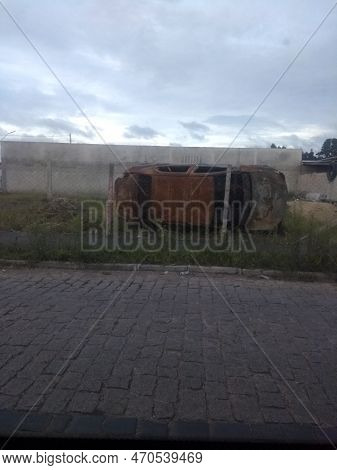 The Old  Abandoned  Car In The Junkyard,