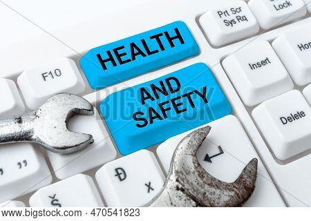Hand Writing Sign Health And Safety. Concept Meaning Taking The Appropriate Steps To Protect Yoursel