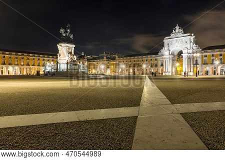 The Illuminated Terreiro Do Paco: A Beautiful Night Scene In Lisbon.