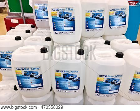 Kiel, Germany - 11 February 2023: A Stack Of Canisters Of The Additive Adblue In A Market
