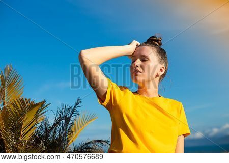Girl Is Suffering From Heat, Woman With Heatstroke. Having Sunstroke At Summer Hot Weather. Dangerou