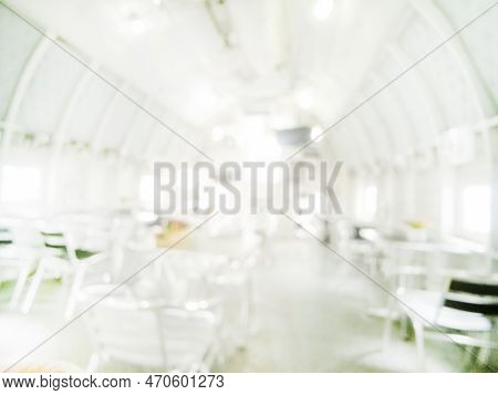 White Blurred Background Bright Restaurant Shopping Mall Silver Gray Lighting. Defocused Store Light