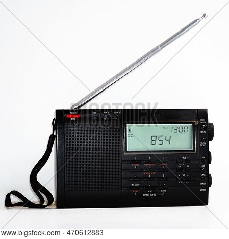 Modern Black Shortwave Radio With Antenna And Digital Display On A White Background