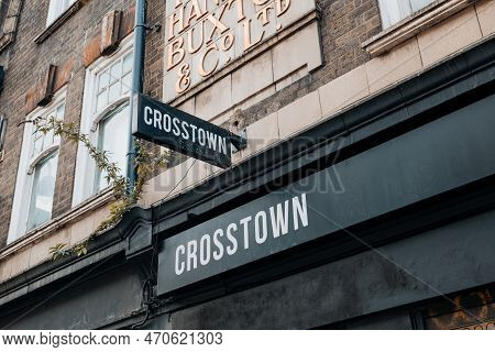 London, Uk - February 09, 2023: Sign Outside Crosstown Doughnuts Shop On Brick Lane, East London. Cr