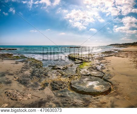 Fabulous Seascape With Rocky Cliffs, Sea Bay, Islets And Faraglioni Near By Frassanito Beach, Salent