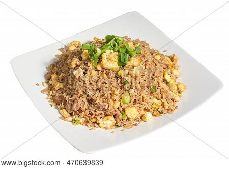 Peruvian Traditional Food. Rice With Meat And Vegetable, Scramble Eggs Decorated With Onian Feather.