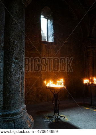 Burning Candles In The Church. Haghartsin, An Armenian Monastery Of The Xi -xiii Century, Located In