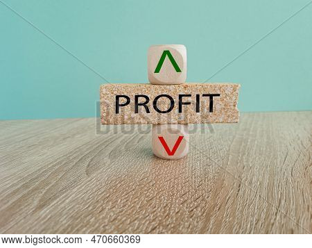 Profit Level Symbol. A Wooden Cube With Up Icon. Brick Block With The Concept Word Profit. Beautiful