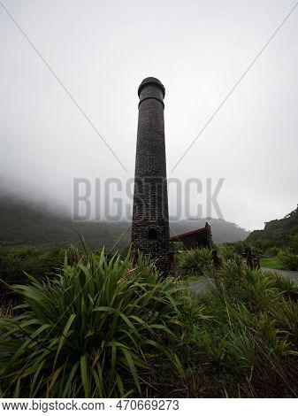 Vertical Shaft Coal Mining Industry Chimney Of Tyneside Mine, Brunner Mine Historic Area At Grey Riv