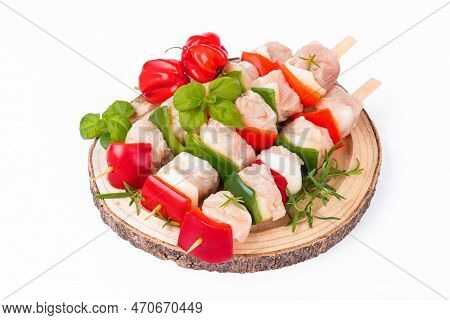 Skewers With Pieces Of Raw Meat, Red, And Green Pepper.top View.uncooked Mixed Meat Skewer With Pepp