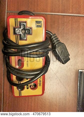 Disconnected Famicom Controller Game Over The Table