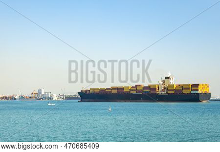 Large Cargo Container Ship Sails In The Seaport