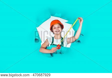 Self-retracting Metal Tape Measure. Little Girl Using A Measuring Tape. Construction Worker With Tap