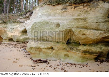 Beautiful In Any Weather, Colorful Sandstone Cliffs. Beautiful Coast Of The Baltic Sea With Caves. V