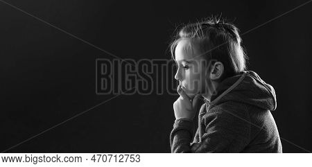 Stressed Boy Over Black Background, Copy Space. Childhood, Bulling And Family Concept. Sad Young Boy