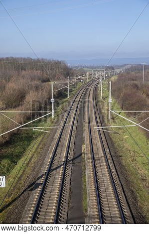 Rails With Electrification For Highspeed Train In Germany Under Blue Sky
