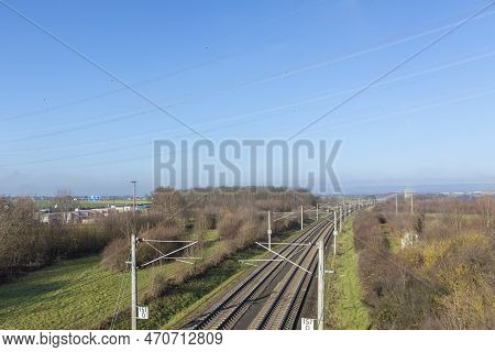 Rails With Electrification For Highspeed Train In Germany Under Blue Sky