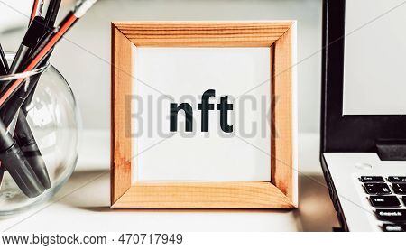 Non-fungible Token Nft, Crypto Art, Digital Art, New Type Of Cryptorurrency. Nft Text In Wooden Fram
