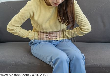 Flatulence Asian Young Woman, Girl Hand In Stomach Ache, Suffer From Food Poisoning, Abdominal Pain 
