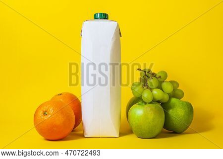 Juice Pack Copy Space,multifruit Oranges Apples Grapes,juice For Drinking,many Objects,hard Shadow,w