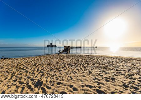 Gdynia, Poland - April 2022: Babie Doly Beach With Old Ruins Of Pier And Ruins Of Torpedo Room On Th
