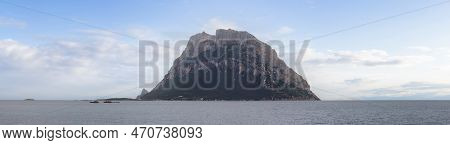 Rocky Coast On The Mediterranean Sea. Punta Don Diego, Sardinia, Italy. Dramatic Sunrise Sky Art Ren