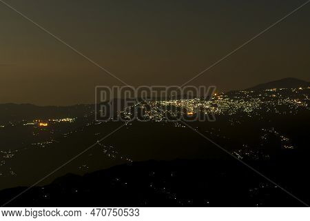 Pearls Of Light Of Queen Of Hills, Darjeeling Town, At Night. In The Eastern Himalayas, To The West 