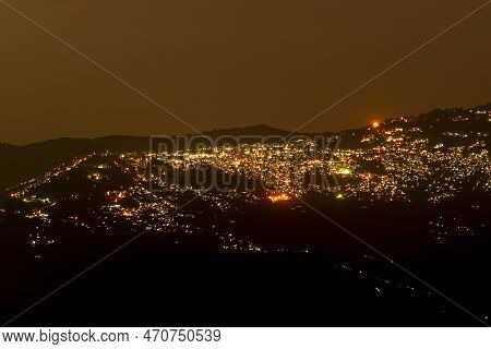 Pearls Of Light Of Queen Of Hills, Darjeeling Town, At Night. In The Eastern Himalayas, To The West 