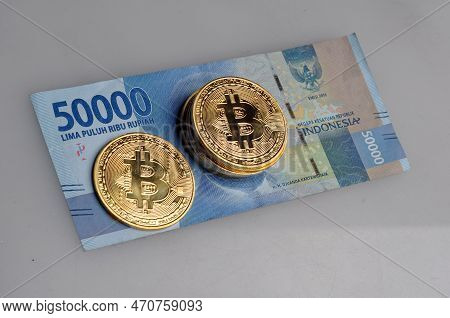 Indonesia Rupiah Money Paper Bitcoin Gold Color