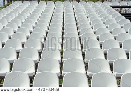 Seats Of Tribune On Sport Stadium. Concept Of Fans, Chairs For Audience, Cultural Environment Concep