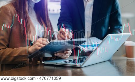 Two Professional Traides On Technical Price Graph And Indicator, Red And Green Candlestick Chart And