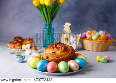 Craffin (cruffin) With Raisins And Candied Fruits. Traditional Easter Bread Kulich And Painted Eggs 
