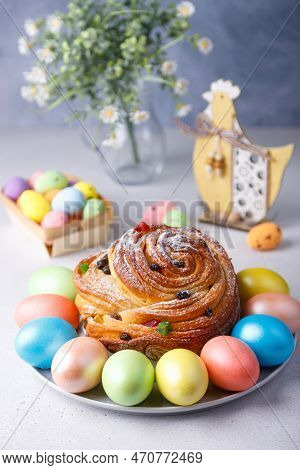 Craffin (cruffin) With Raisins And Candied Fruits Sprinkled With Powdered Sugar. Traditional Easter 