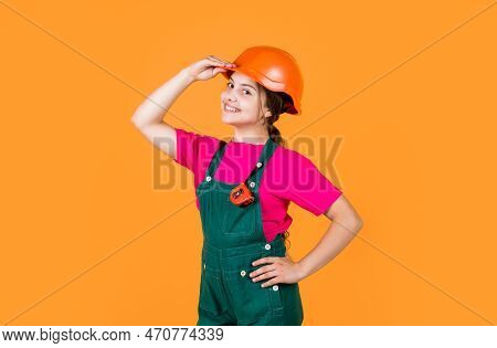 Hello. Little Girl Using A Measuring Tape. Construction Worker With Tape Measure. Cute Kid As A Cons