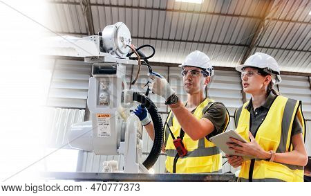 Two Caucasian Engineers Electrical Electronic Man And Woman Set Up Program And Inspect Electrical Wi