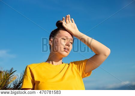 Girl Is Suffering From Heat, Woman With Heatstroke. Having Sunstroke At Summer Hot Weather. Dangerou