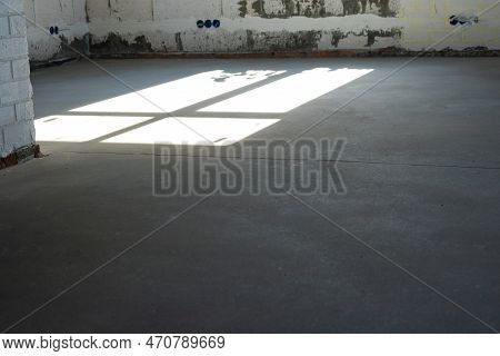 The Leveled Rough Floor In A House Under Construction With A Semi-dry Cement Screed Is A Smooth Surf