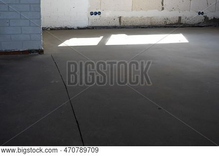 The Leveled Rough Floor In A House Under Construction With A Semi-dry Cement Screed Is A Smooth Surf