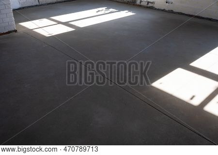 The Leveled Rough Floor In A House Under Construction With A Semi-dry Cement Screed Is A Smooth Surf